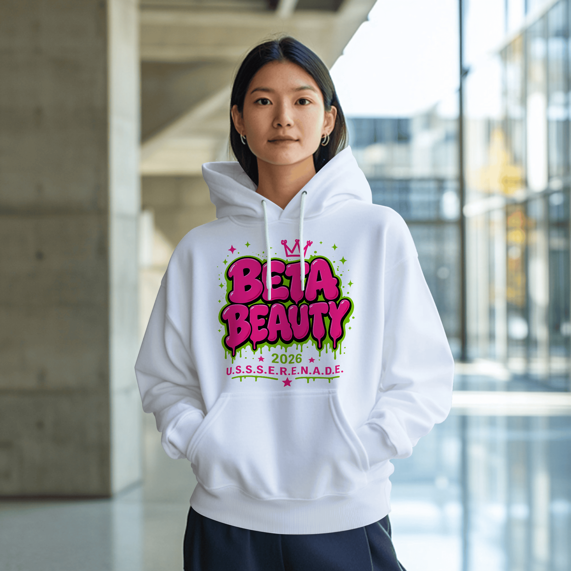 Model wearing the Beta BEAUTY Signature Hoodie, oversized fit