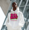 Model wearing the Beta BEAUTY Signature Hoodie, architectural background